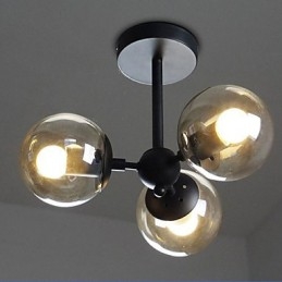 Lampadario a fagiolo in ferro nero con sfere di vetro