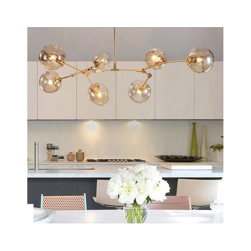 Lampadario contemporaneo a 7 luci con paralumi in vetro trasparente 120 x 42 cm