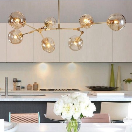 Lampadario contemporaneo a 7 luci con paralumi in vetro trasparente 120 x 42 cm
