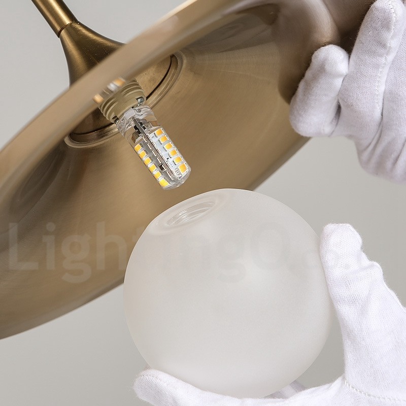 Lampada a sospensione industriale mini 1 luce oro e nero con paralume in vetro trasparente