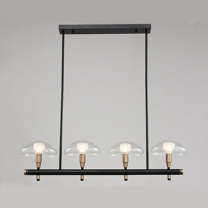 Lampadario lineare a 4 luci oro e nero con paralumi in vetro trasparente