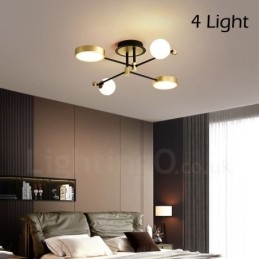 Lampadario moderno nero e oro in metallo con paralume in acrilico