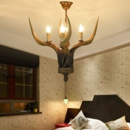 Lampadario rustico vintage a 4 luci con corna di cervo