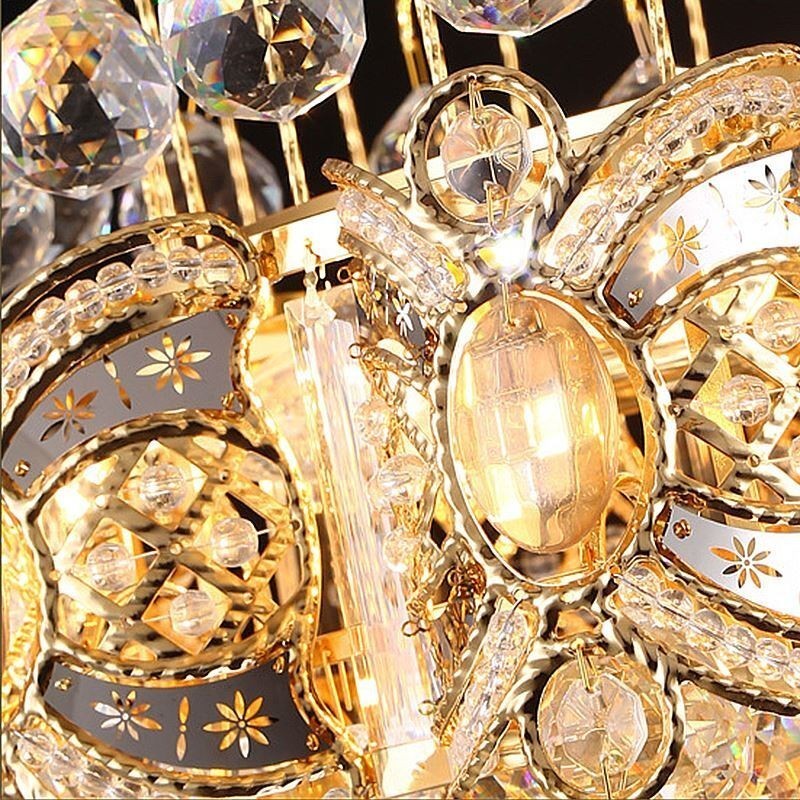 Lampadario a sospensione in cristallo color oro