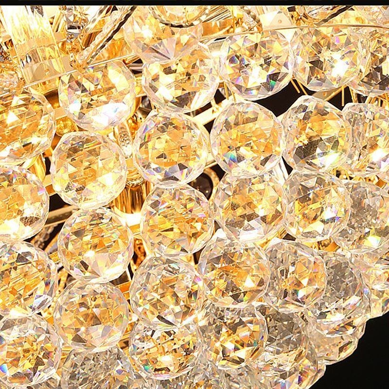 Lampadario a sospensione in cristallo color oro