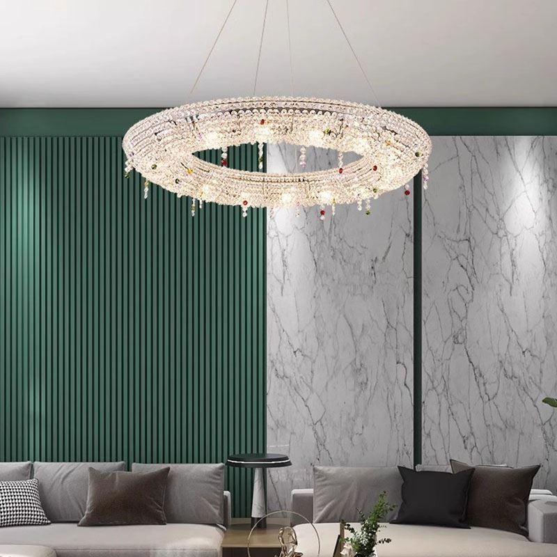 Lampada a sospensione in cristallo moderna con struttura in acciaio inox