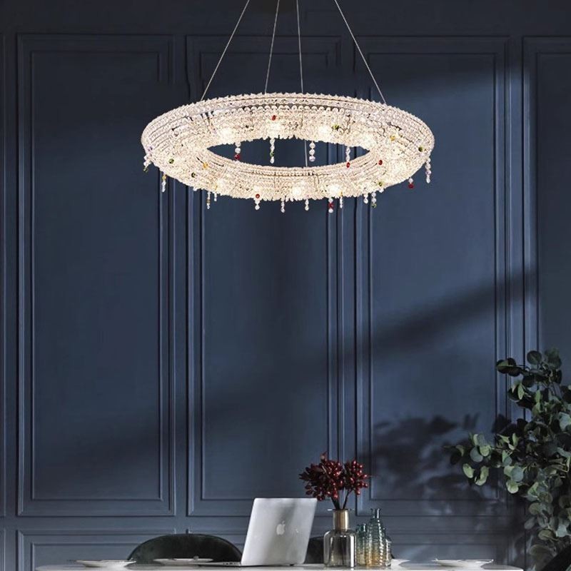 Lampada a sospensione in cristallo moderna con struttura in acciaio inox