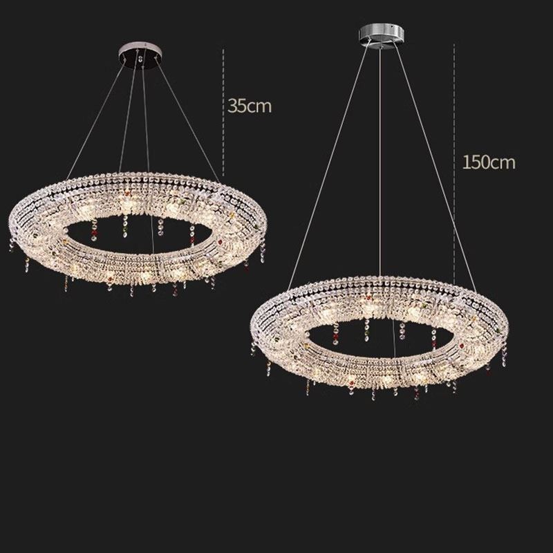 Lampada a sospensione in cristallo moderna con struttura in acciaio inox