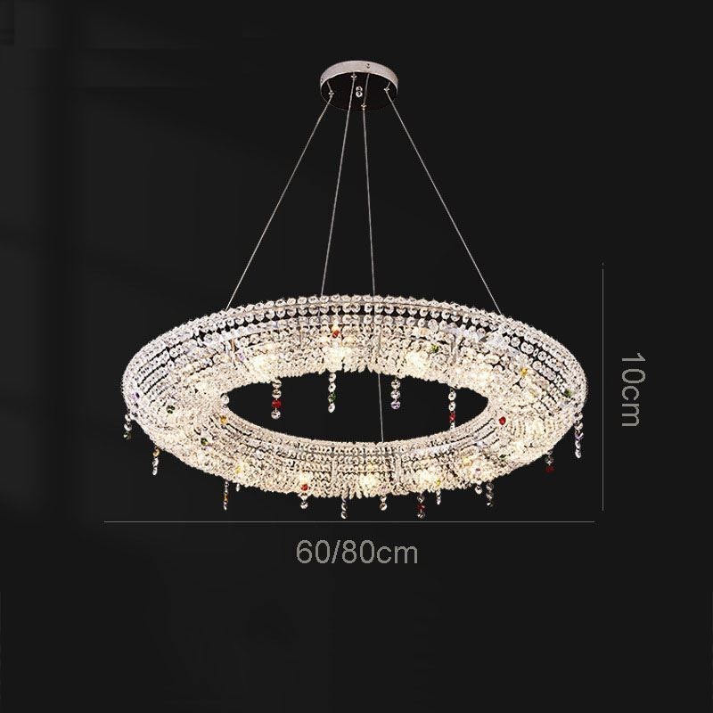Lampada a sospensione in cristallo moderna con struttura in acciaio inox