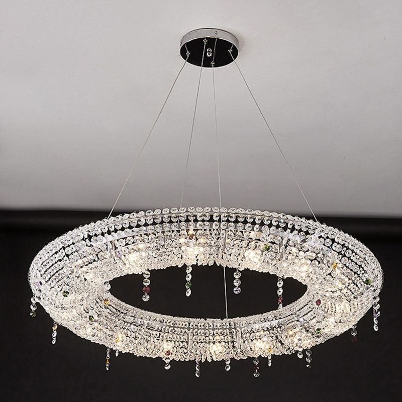Lampada a sospensione in cristallo moderna con struttura in acciaio inox