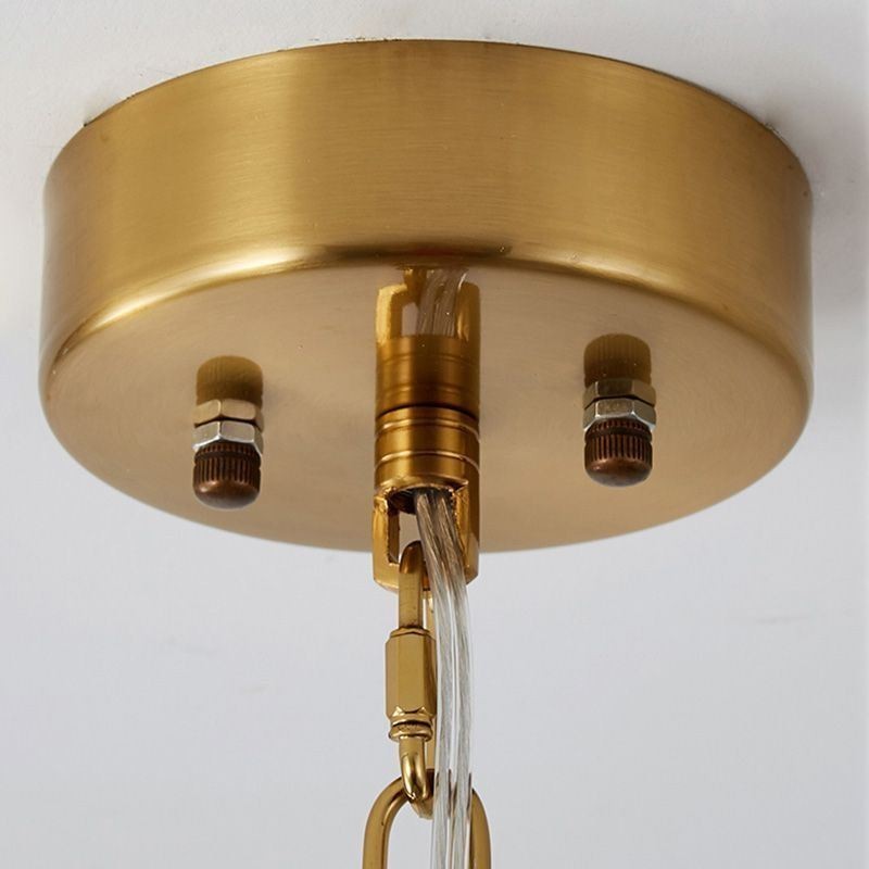 Lampadario moderno in vetro con decorazioni in bronzo e oro