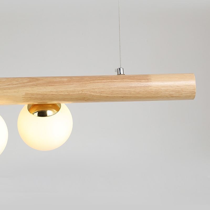Lampada a sospensione Magic Bean in legno e vetro con strisce di legno