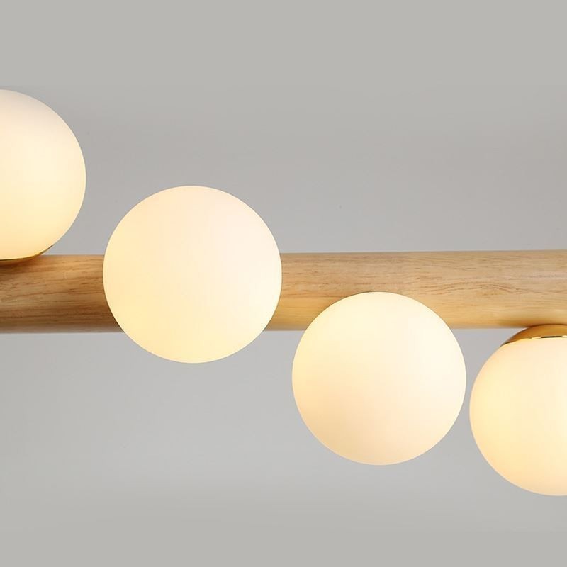 Lampada a sospensione Magic Bean in legno e vetro con strisce di legno
