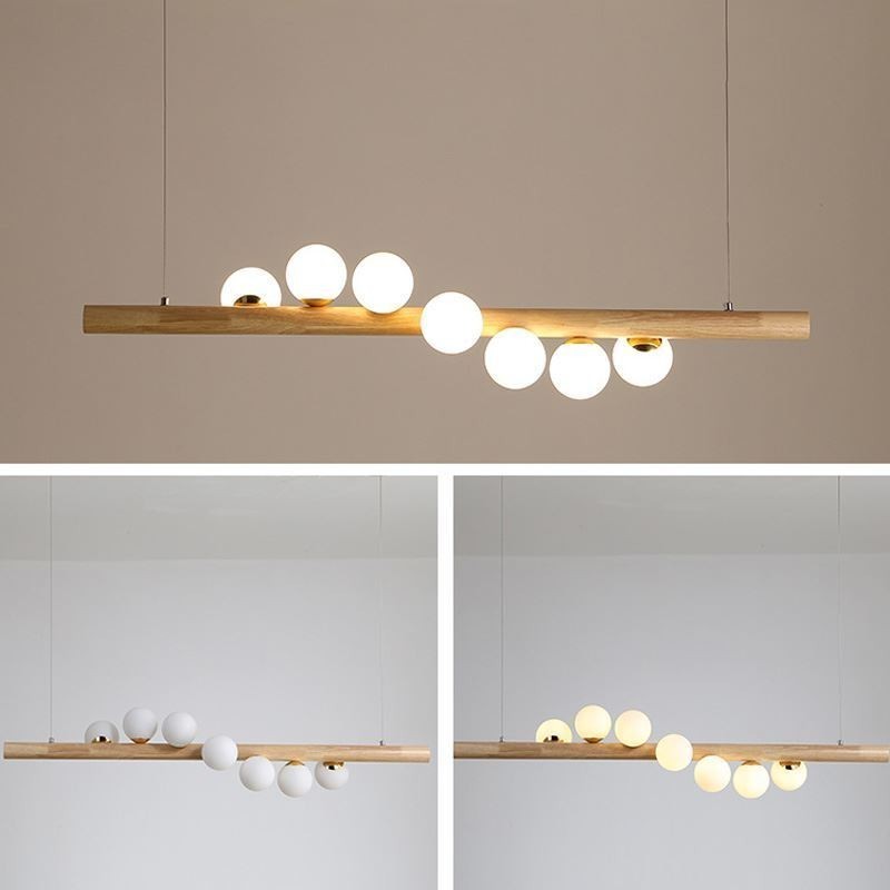 Lampada a sospensione Magic Bean in legno e vetro con strisce di legno