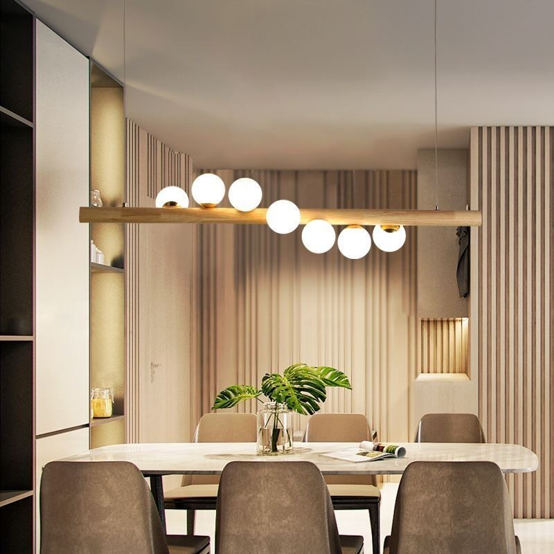 Lampada a sospensione Magic Bean in legno e vetro con strisce di legno