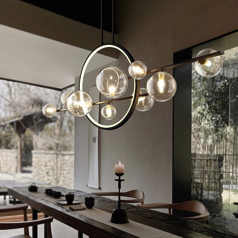 Lampadario a sospensione moderno in metallo con bolle di vetro trasparente