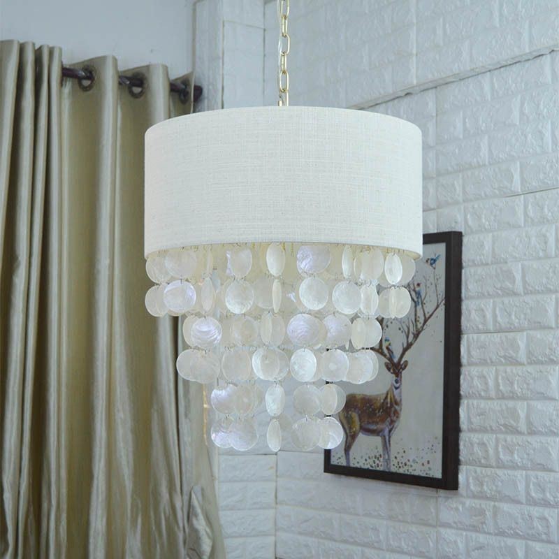 Lampada a sospensione contemporanea con gusci di medusa e paralume cilindrico