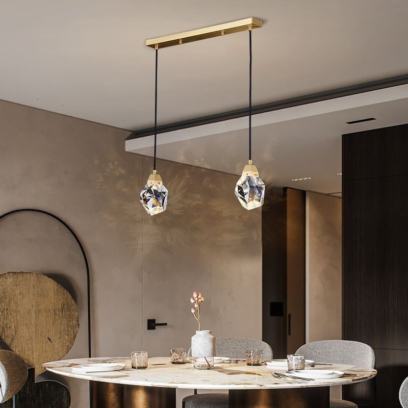 Lampada a sospensione LED semplice con sfera in cristallo e ottone
