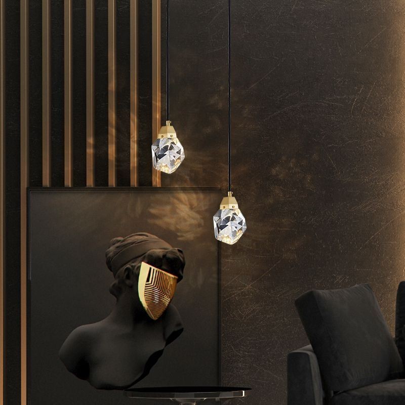 Lampada a sospensione LED semplice con sfera in cristallo e ottone
