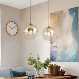 Lampada a sospensione in ferro e vetro con globo decorativo