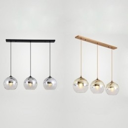 Lampada a sospensione in ferro e vetro con globo decorativo