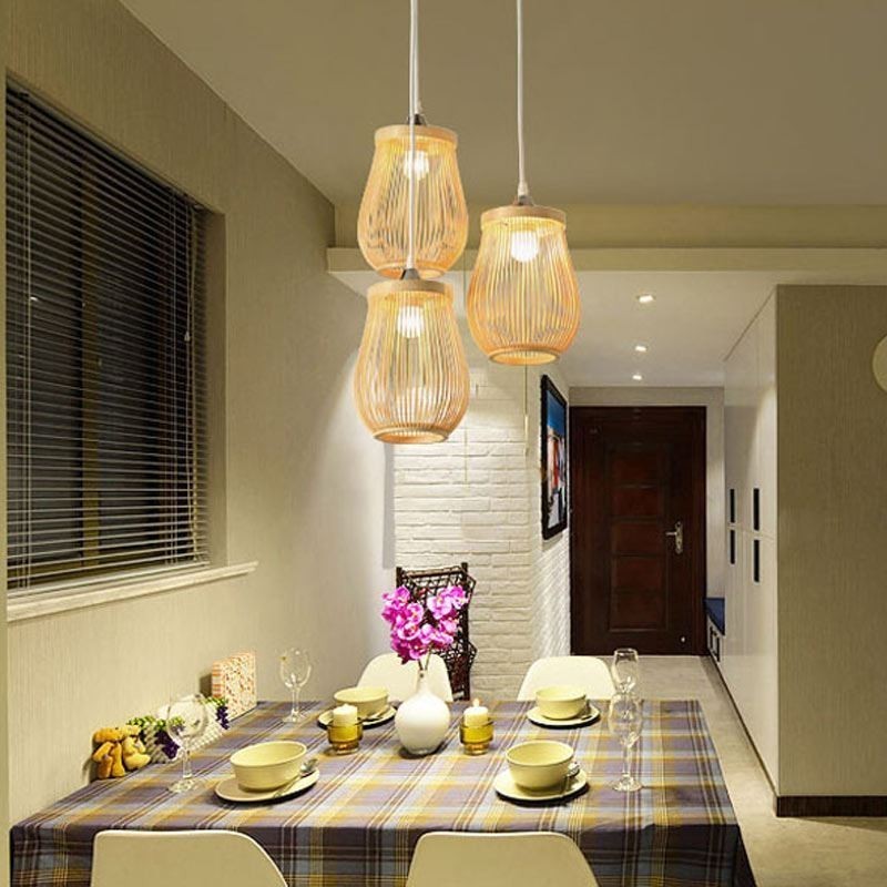 Lampada a sospensione in bambù a gabbia cava moderna