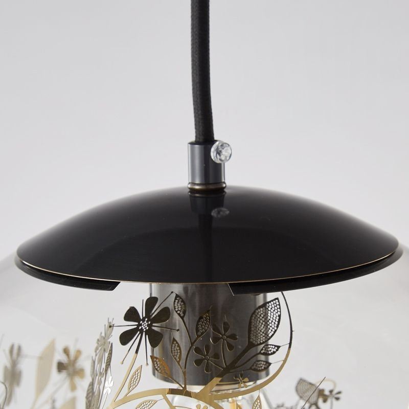 Lampada a sospensione in vetro a sfera con foglie natalizie, ottone, 25 x 25 cm