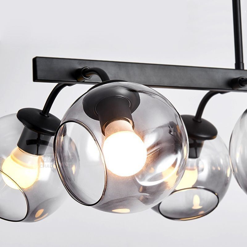 Lampada a sospensione Magic Bean in vetro con globo di illuminazione