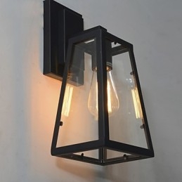 Applique da parete retrò in ferro nero con paralume in vetro trasparente