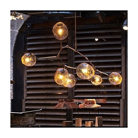 Lampadario a 7 luci in vetro trasparente con dettagli in metallo oro e nero