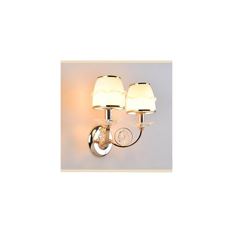 Applique da parete LED moderna contemporanea elettroplaccata con braccio oscillante in cristallo E14