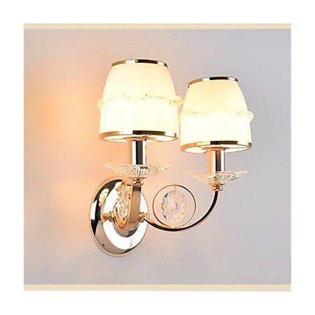 Applique da parete LED moderna contemporanea elettroplaccata con braccio oscillante in cristallo E14