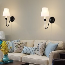 Applique da parete rustica in ossido nero con luce ambientale