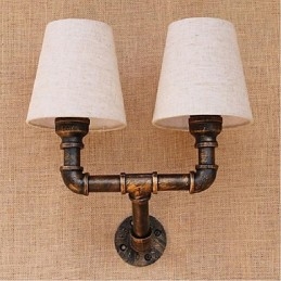 Applique da parete rustica in ottone con paralume in tessuto