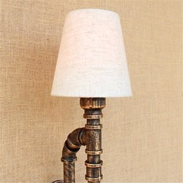 Applique da parete rustica in ottone anticato con lampadina E26/E27 inclusa