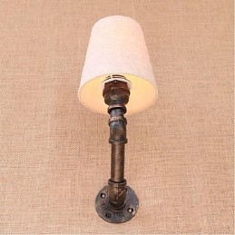 Applique da parete rustica in ottone con luce ambientale