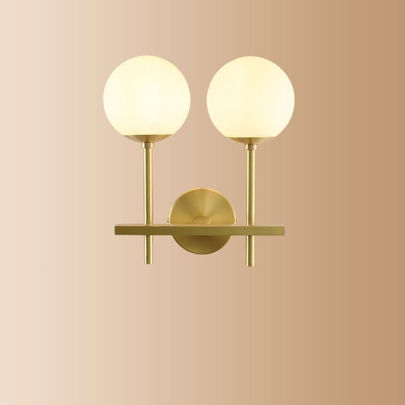 Modern Molecules Bean Applique da parete 2 luci con paralume in vetro sferico in ottone E14