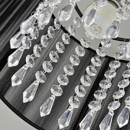 Lampada a sospensione moderna in metallo nero e cristallo
