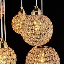 Lampada a sospensione moderna in metallo placcato oro con cristalli a globo